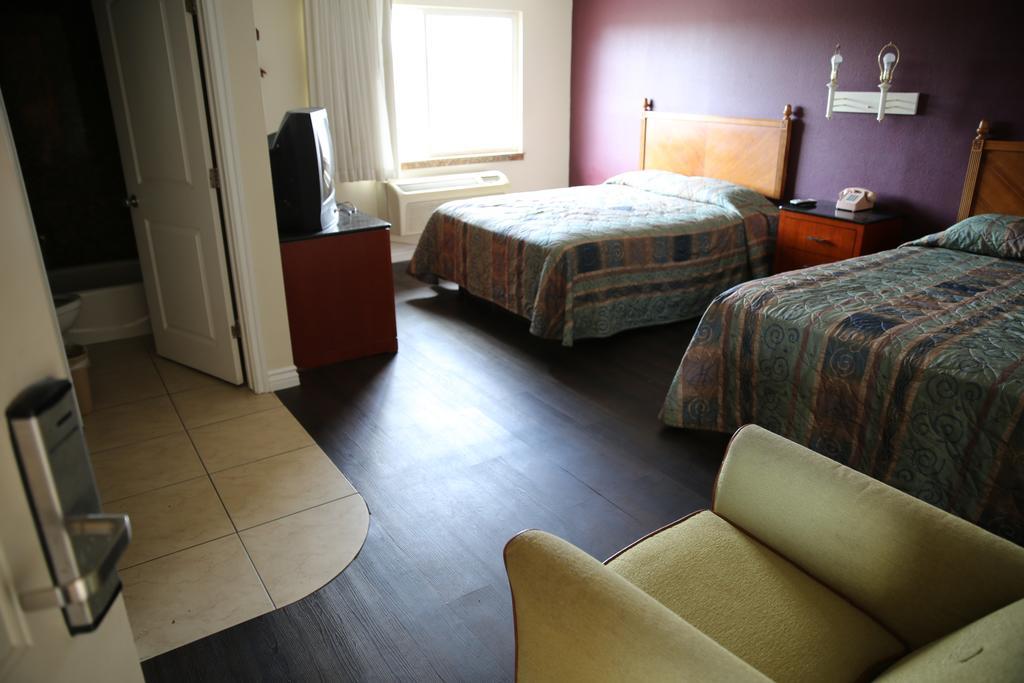 Chateau Inn & Suites Дауни Экстерьер фото